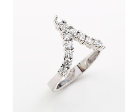 White gold 750, 4.9 g. Decorative, beautifully shaped ring set with 12 diamonds totalling approx. 0.60 ct, H/VS, signed with 