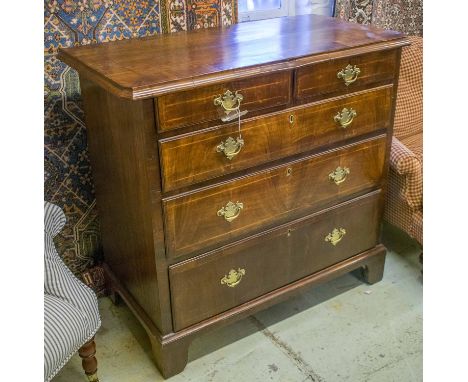 CHEST, Queen Anne walnut and line inlaid with a crossbanded canted corner top over two short and three long drawers on later 