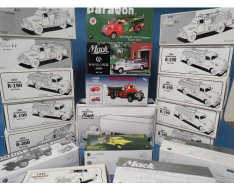 NINETEEN BOXED FIRST GEAR FIRE ENGINES AND FIRE RELATED VEHICLES, 1:34 and 1:30 scale