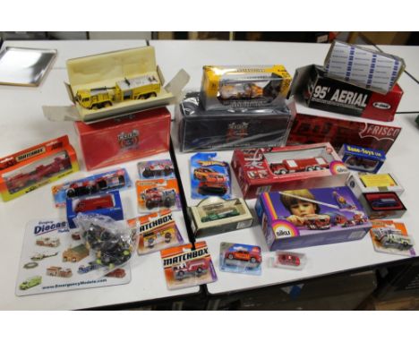 ELEVEN BOXED FIRE ENGINES - VARIOUS MAKES AND SCALES, to include Code 3 x 2, Pierce, Siku x 2, E-One etc., together with nine
