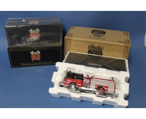 FOUR BOXED CODE 3 FIRE ENGINES, to include 1:64 scale FDNY Seagrave Ladder Co.24, 1:64 scale Terrytown NY American LaFrance T