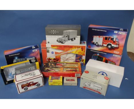 TEN BOXED FIRE AND POLICE VEHICLES, to include First Gear 1:34 Dry goods Van, 3 x Iveco Magirus Fire Engines, Joal Fire Engin