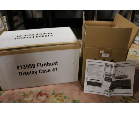 A BOXED CODE 3 COLLECTIBLES 1:136 SCALE LIMITED EDITION FIRE BOAT, Chicago Fire Department, together with a boxed fire boat d