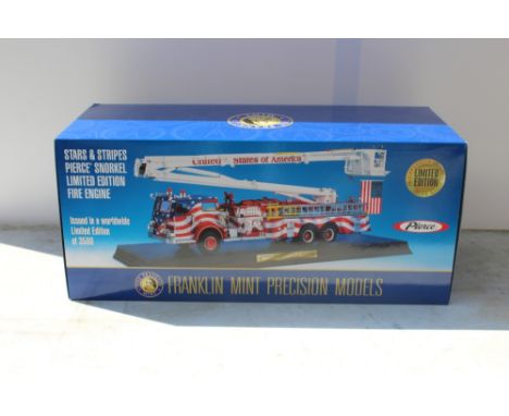 THE FRANKLIN MINT PRECISION MODELS, a boxed Stars and Stripes Pierce Snorkel fire engine, scale 1:32 die cast model fire engi