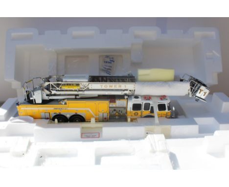 THE FRANKLIN MINT PRECISION MODELS, a boxed limited edition yellow Emergency One HP 105 Platform fire engine die cast model 1