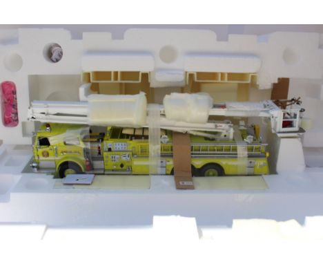 THE FRANKLIN MINT PRECISION MODELS, a boxed limited edition yellow Pierce Snorkel fire engine, die cast 1:32 scale model, app