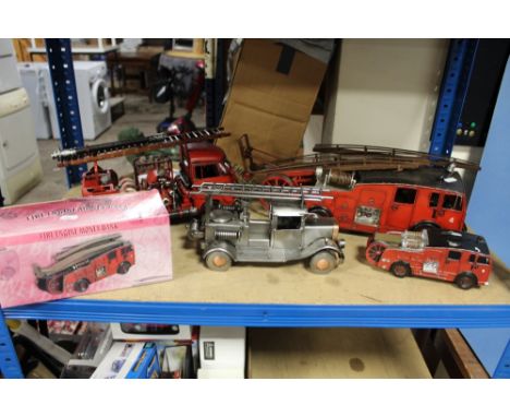 TWO TIN PLATE FIRE ENGINES, a metal fire engine and two fire engine money boxes