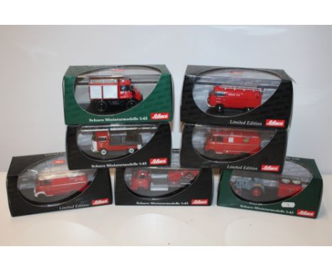 FOUR BOXED SCHUCO MINIATURMODELLES, to include fire engines and tractor, together with three boxed Schuco limited edition van