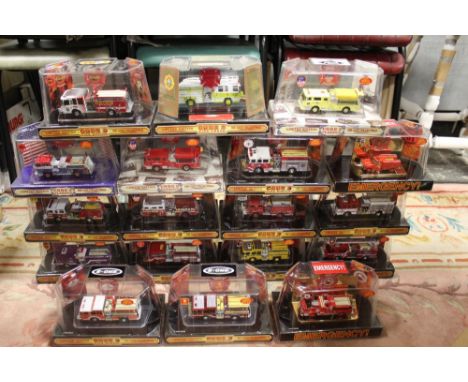 EIGHTEEN BOXED CODE 3 COLLECTIBLES FIRE ENGINES, all limited editions, to include Mississauga Fire Department, Plainfield Das