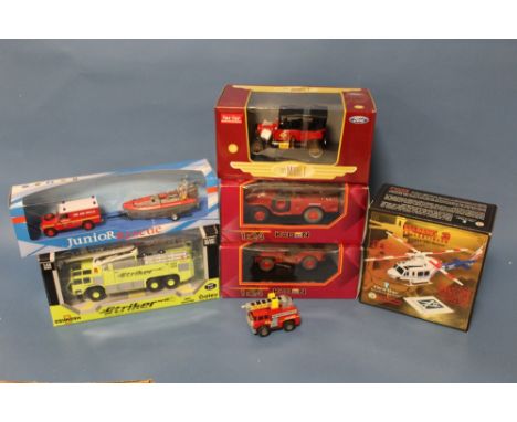 A BOXED SUN STAR MODEL T FIRE CHIEF 1:24 SCALE, a pair of boxed Kaden 1:24 scale vehicles, boxed Oshkosh Striker Aircraft Res