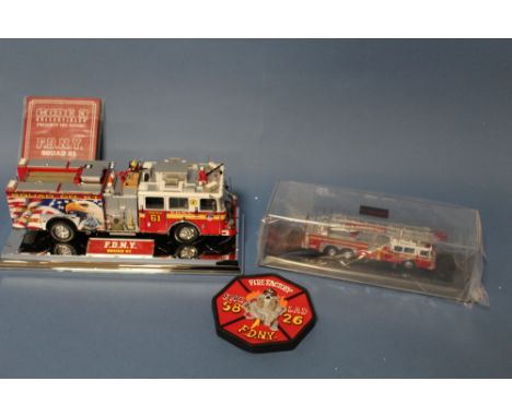 A BOXED CODE 3 COLLECTABLES 1:64 SCALE LIMITED EDITION SEAGRAVE REAR MOUNT LADDER, together with a 1:32 scale Code 3 Collecta