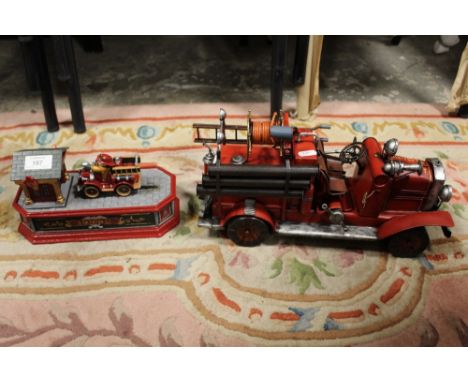 CAST IRON FIRE STATION / FIRE ENGINE MONEY BOX TOGETHER WITH A TIN PLATE FIRE ENGINE