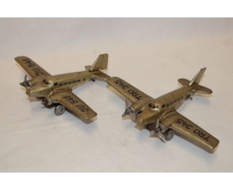 Two 1950/60s tin plate clockwork twin engine aircraft, 6½" wide