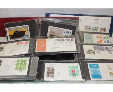 A 1977 album of mint Commonwealth commemorative stamps and four albums of various GB first day covers, etc