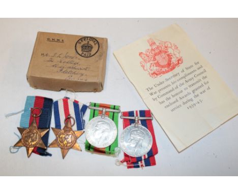 A 1939/45 star, France and Germany star, Defence medal and War medal in box of issue with Army Council slip