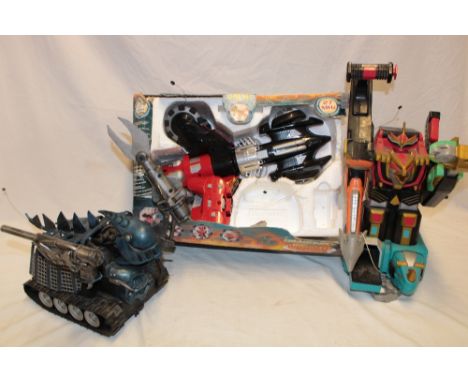 A Dragonfly Majorette remote controlled rocket vehicle and two various robot figures