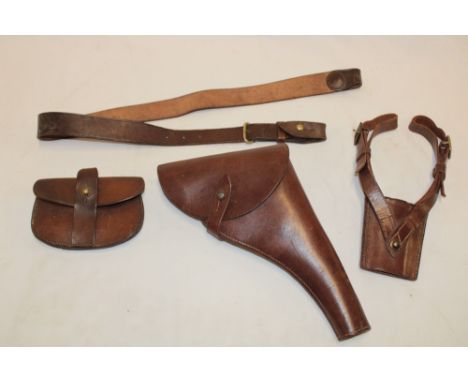Various brown leather Sam Browne fittings including military holster, ammunition pouch, sword suspension and cross strap