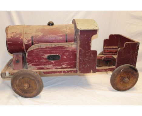 A 1920's Lines Brothers wooden pedal train engine (for restoration) 43" long (af)