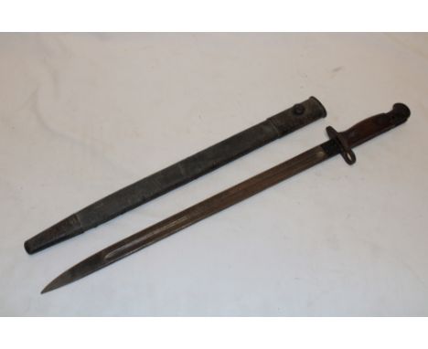 A First War 1907 pattern Lee Enfield bayonet dated 1918 in steel mounted leather scabbard