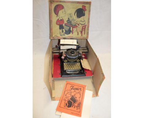 A German "Junior" tinplate typewriter in display box