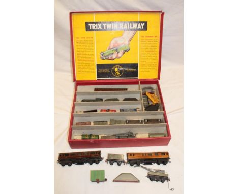 Trix Twin Railway - a BR tank engine and tender, 3 tinplate coaches, a selection of tinplate goods wagons and accessories in 