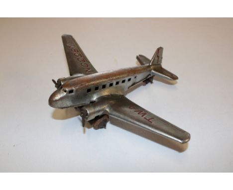A 1930's/40's clockwork tinplate twin engine aircraft