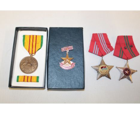 A USA Vietnam Service medal in box of issue and three various National Vietnamese Army medals (4)