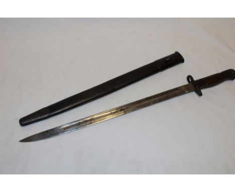 A First War 1907 pattern Lee Enfield bayonet by Wilkinson dated 1907 in steel mounted leather scabbard