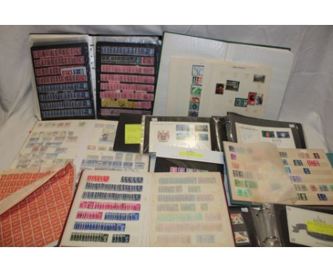 Various albums and stock books containing a selection of GB stamps together with an album of presentation packs and one other