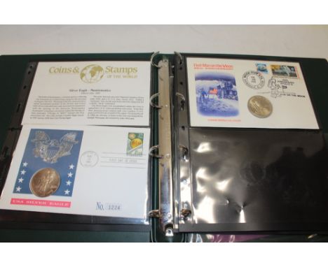 An album containing a selection of medallic postal covers including 1991 USA silver eagle dollar cover, 1969 First Man on the