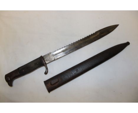 A Second War German Mauser bayonet with saw-back blade by E & F Horster of Solingen in steel scabbard