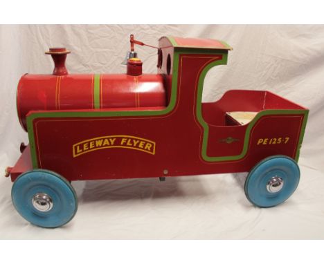 A 1950's Leeway wooden child's pedal train engine 44" long