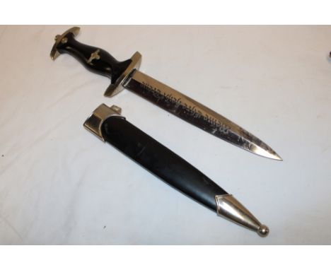 A copy German SS dagger and scabbard