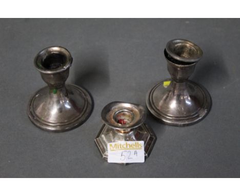 Pair of silver candlesticks and silver plated candlestick  