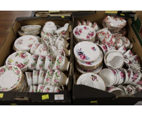 Two boxes of mixed floral teacups and saucers, milk jugs, sugar bowls, etc 