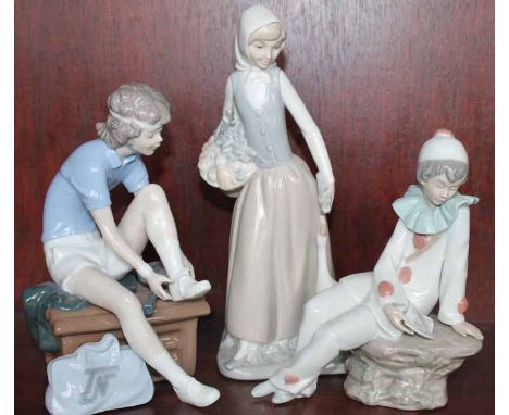 NAO FIGURE OF A GIRL WITH A GOOSE
together with a Nao figure of a tennis player and a Nao figure of a clown (3)