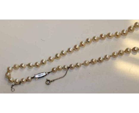 TWO PAIRS OF TANZANITE EARRINGS AND A PEARL NECKLACE 