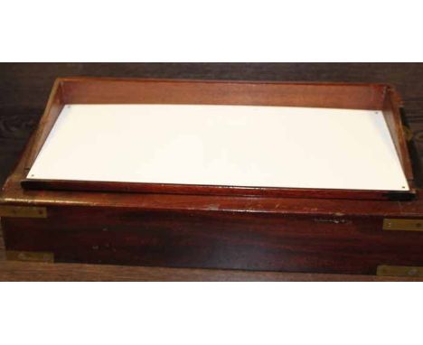 WATCHMAKER'S INTEREST: VICTORIAN MAHOGANY AND BRASS MOUNTED CONVERTED WRITING SLOPE
converted to a watchmaker's work station,