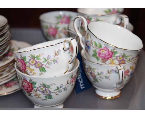 ROYAL ALBERT PART TEA SERVICE
decorated with floral swags on an ivory ground, and with gilt highlights, together with a Royal