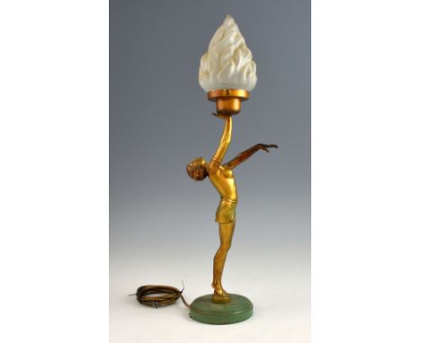 Art Deco patinated spelter figural lamp, dancing girl with flame form glass shade, on metal base,  65 cm .      Missing littl