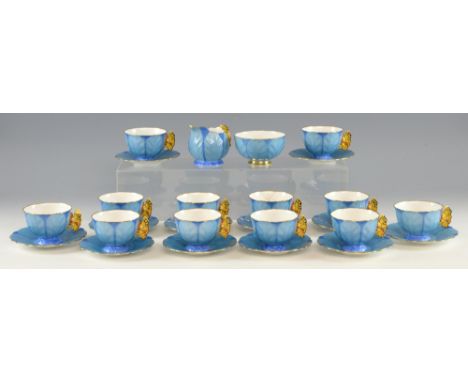  An Aynsley Art Deco tea service, petal form with handles moulded as butterflies, hand painted in enamels, (registered design