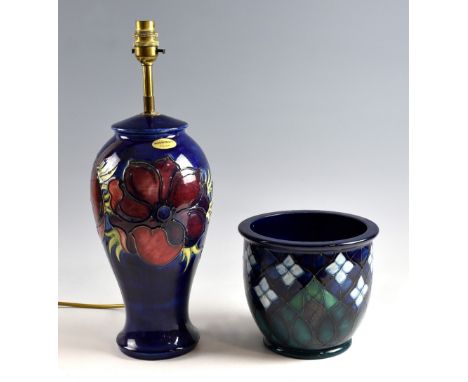 Moorcroft anemone pattern lamp base with deep red flowers on a blue ground, impressed marks, total height 43 cm and a Moorcro