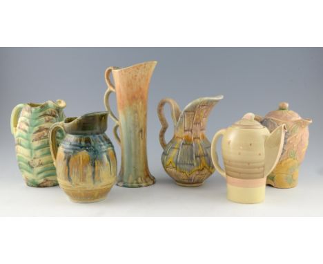 Susie Cooper Crownworks Burslem Art Deco coffee pot, and a collection of 1930s jugs and coffee pots including drip glaze by S