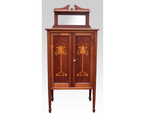 Early 20th C mahogany music cabinet with inlaid Art Nouveau style decoration of stylised flowers  .      Good condition, inla