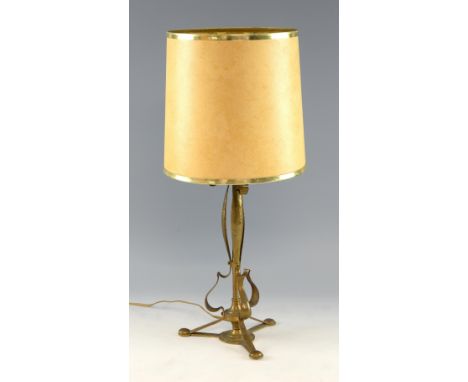 A brass table lamp with hammered finish  36cm.      
