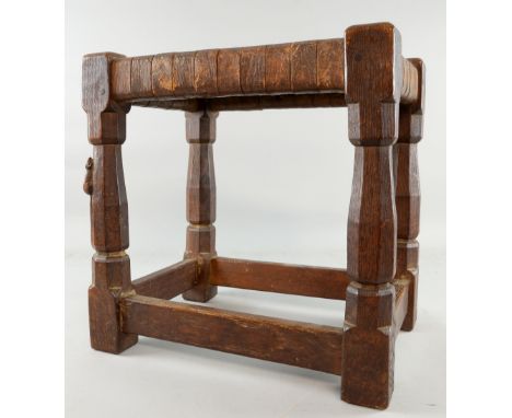  Robert Thompson 'Mouseman' oak joint stool, in chamfered legs with plain cross stretchers, woven strap leather seat, 36 x 36