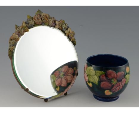 Moorcroft Clematis pattern jardinière, decorated with pink flowers on a blue ground, signature to base and Moorcroft made in 