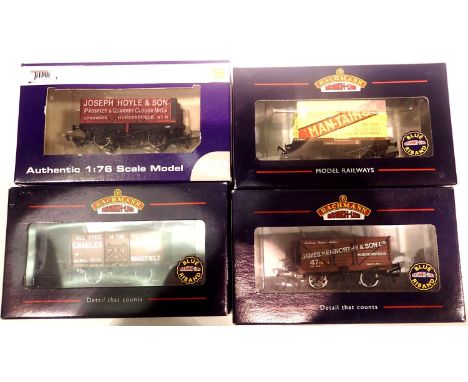 Four Bachmann wagons including Conflat and Man-tain container, Model Rail exclusive.  P&amp;P Group 1 (£14+VAT for the first 