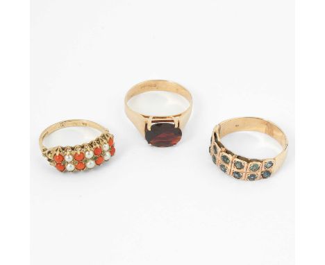 Three yellow metal gem set dress rings, including a 9ct gold coral and pearl double row ring, ring size N, gross weight appro