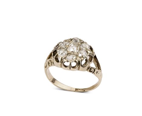 A Victorian yellow gold and diamond cluster ring, set with seven mixed old-cut diamonds, ring size J½, scroll work split shou